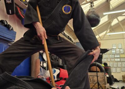 2025 UK Taikai Hanbojutsu - A student from Elkton, Maryland gets Waki Tsubo with the Hanbo.