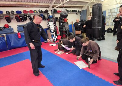 2025 UK Taikai Koto Ryu Koppojutsu - Kancho helps with notes.